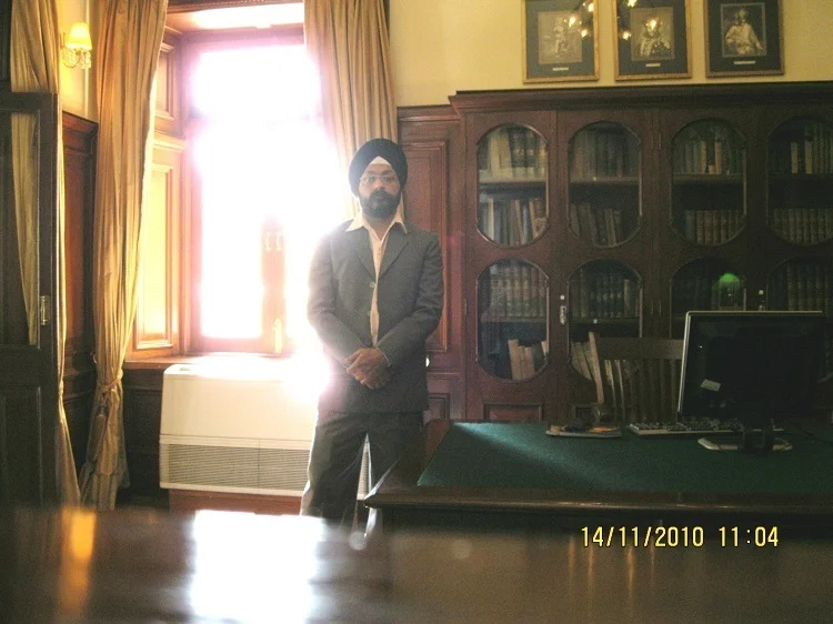 Dr.A.S.Kalra Astrologer in library at Ananda in the Himalayas